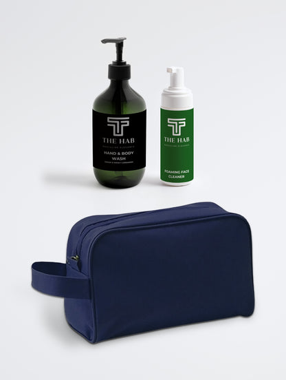 The HAB Gym Kit: Hand and Body Wash Ginger Cardamom and Foaming Face Cleaner with the navy toiletry bag